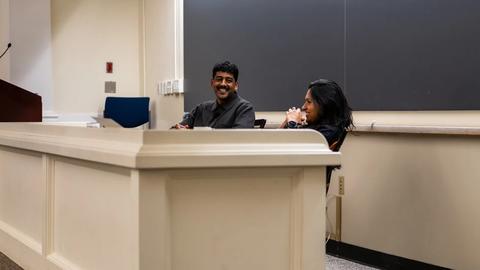 Anuk Arudpragasam and Tara K. Menon, mid-conversation