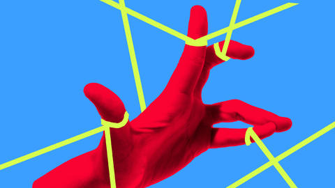 A red hand with yellow string wrapped around the fingers on a blue background