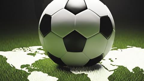 An image of a soccer ball resting on a map of the world. There is a silhouette of a soccer player kicking a ball in the background.