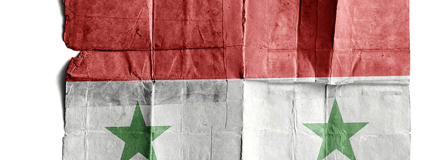 torn and folded Syria flag pattern