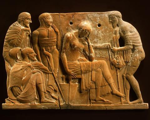 An ancient Greek teracotta plaque, depicting Odysseus returning to Penelope